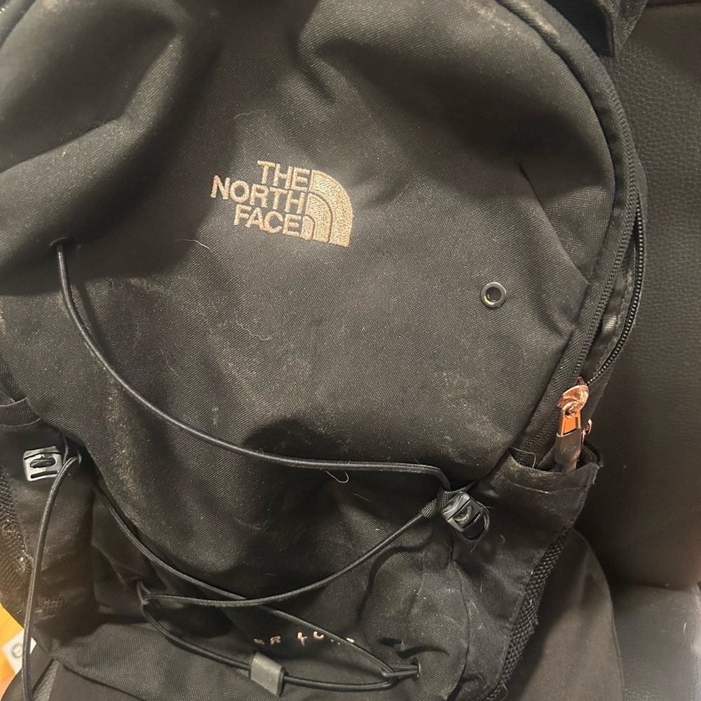 The North Face Black Backpack with Rose Gold Accents